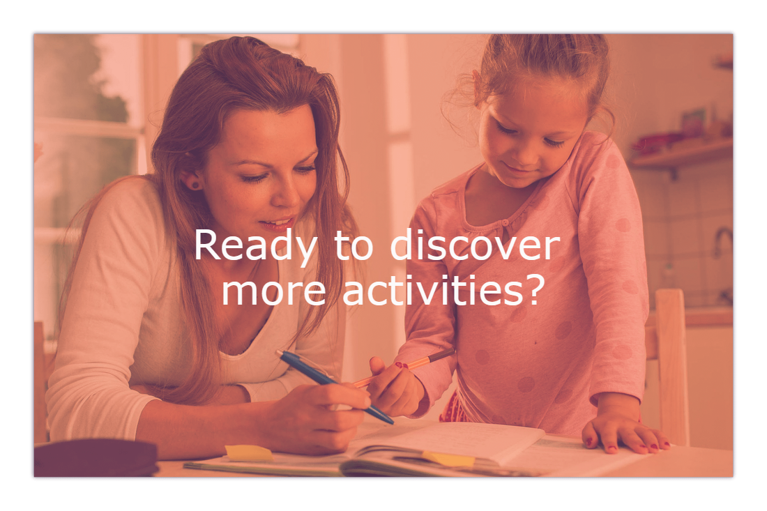 Girl and mother or teacher looking at learning activities